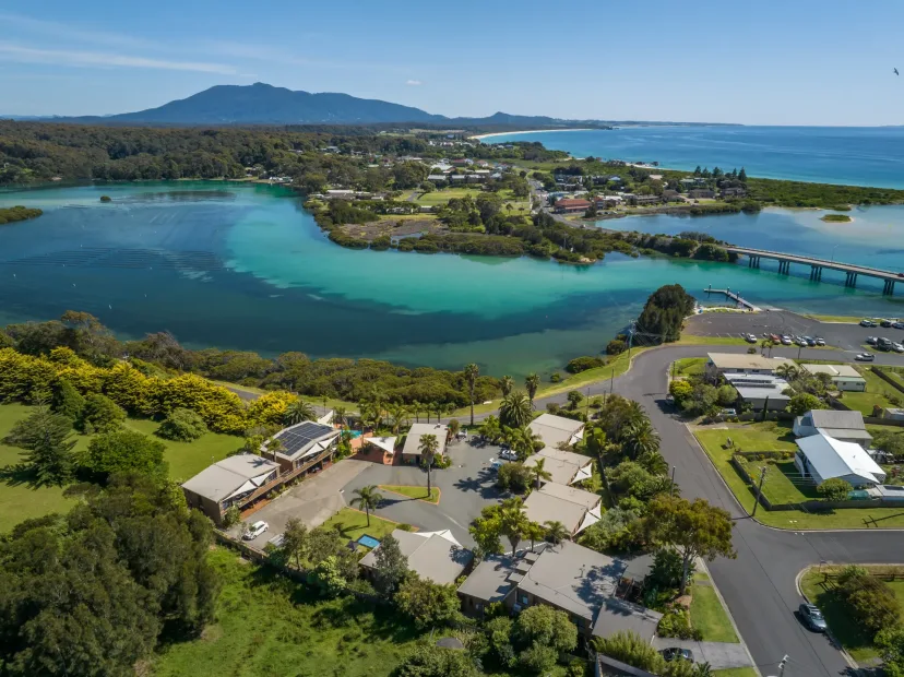Aerial view of the property and the Bermagui River inlet, looking towards the sea