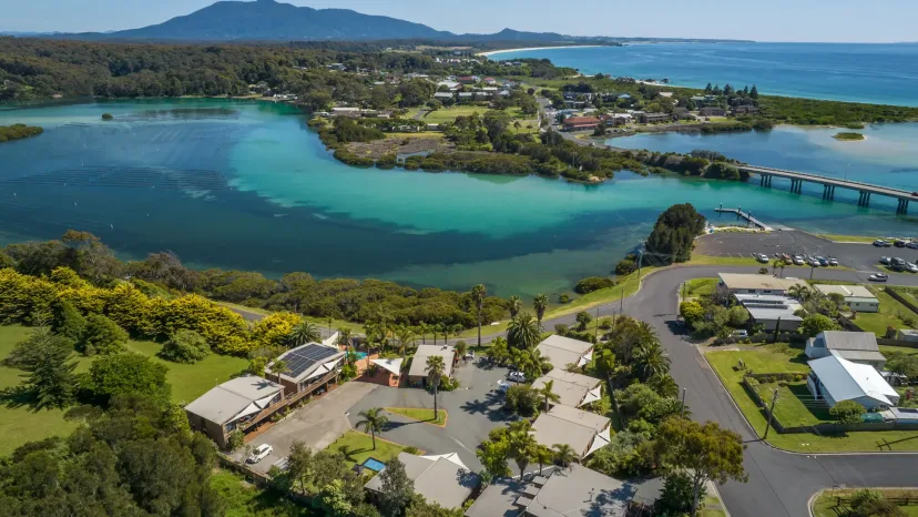 Aerial view of the property and the Bermagui River inlet, looking towards the sea