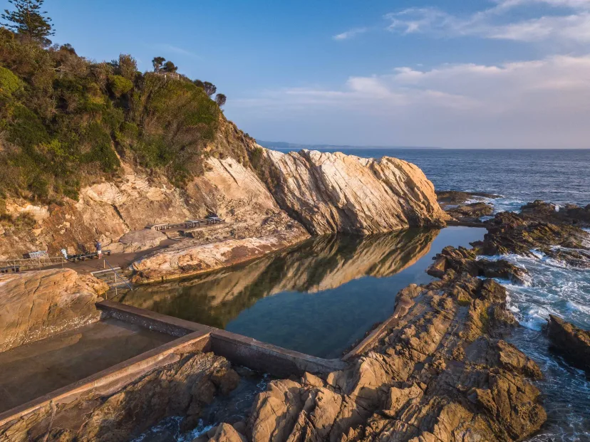 The Blue Pool set into the rock platform, with the ocean beyond